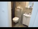 Ferienwohnungen Ivo - free parking & BBQ: A1(6) Sinj - Riviera Split  - Ferienwohnung - A1(6): Badezimmer mit Toilette