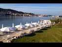 Ferienhaus Mirjana - beautiful garden with barbecue: H(4+1) Trogir - Riviera Trogir  - Kroatien - Strand